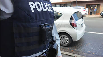 Body worn camera on officer's vest