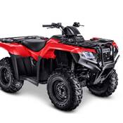Stock image of a red Honda all-terrain vehicle, model TRX420