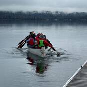 Paddlers with canoe “Schéxwem” on Cultus Lake