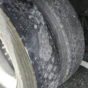 Truck tires with insufficient depth, including patches that are completely bald