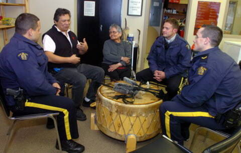members of the Downtown Safety Unit speaking with local First Nations elders